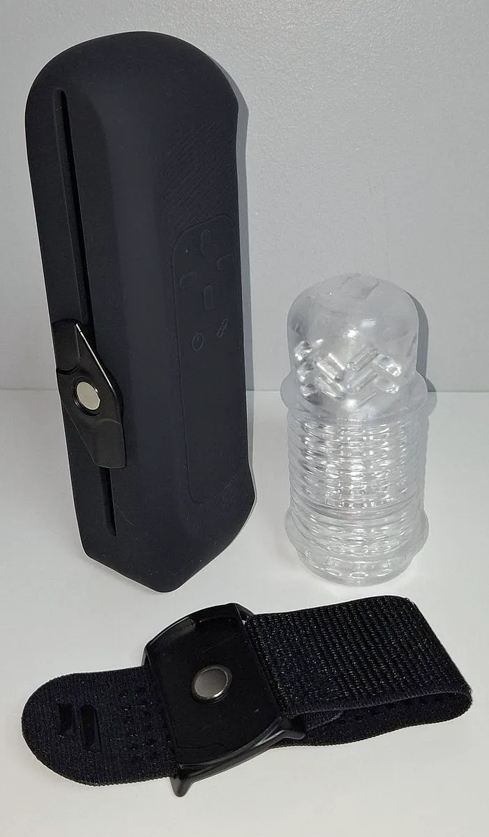 The Handy 2 standing next to its band with the ClickOn clip and a clear sleeve